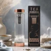 Stiklinė arbatos gertuvė su sieteliu „Rose Gold“ – rožinio kvarco ramybės ritualas